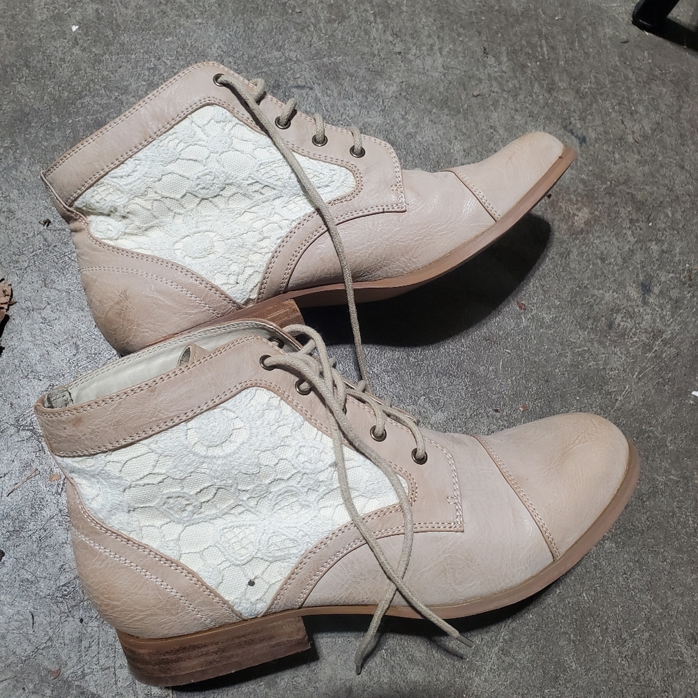 Gently used boots. Lace up boots.